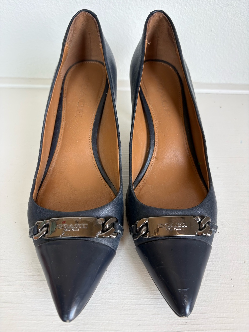 Coach Navy Pointed Toe Pumps with Silver Chain Plate 7.5